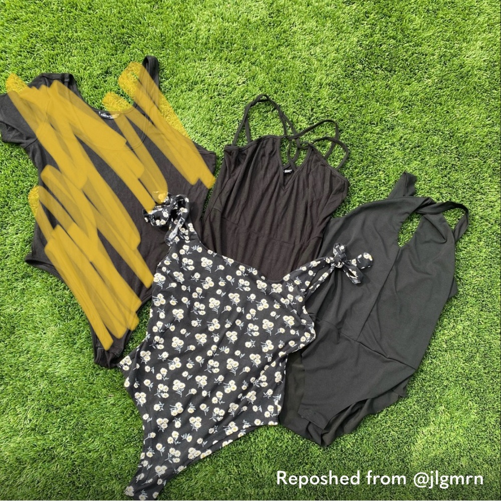 THREE body suits. all in great condition